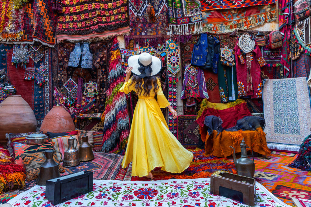 Beautiful girl at traditional carpet shop in Goreme city, Cappad